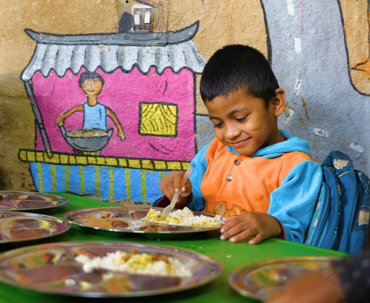 Bridging the Nutritional Gap: The Impact of India's Mid Day Meal Scheme and Feeding India's Program