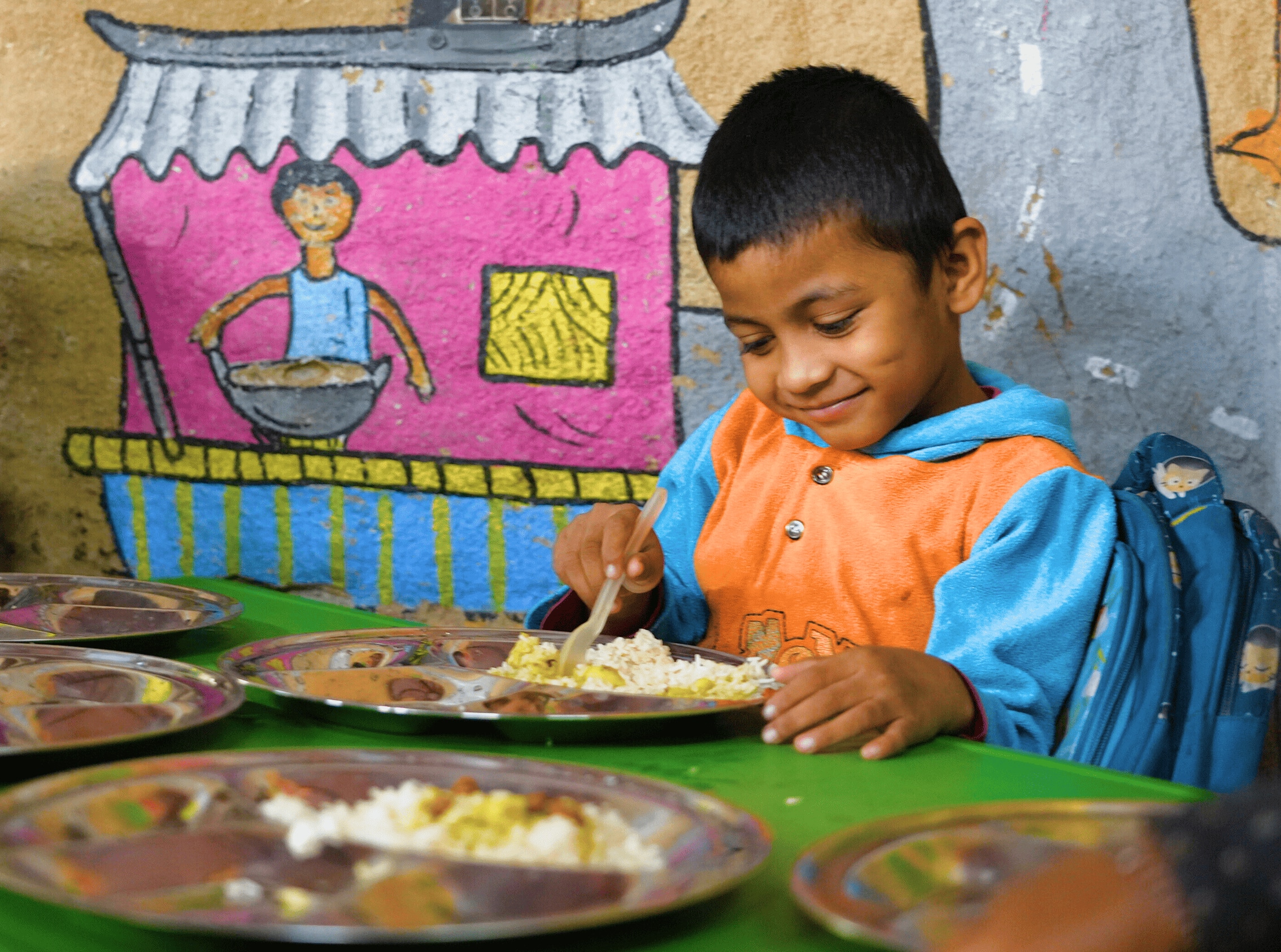 Bridging the Nutritional Gap: The Impact of India's Mid Day Meal Scheme and Feeding India's Program