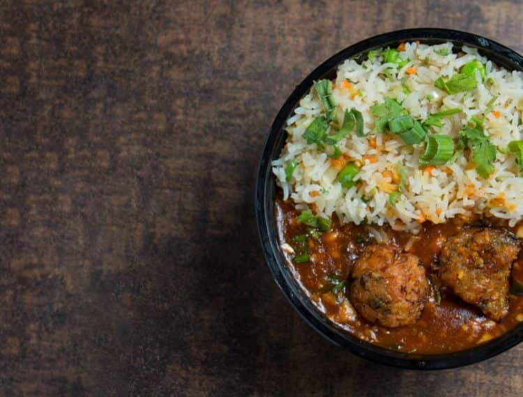 Veg Fried Rice With Veg Manchurian Gravy [Half]