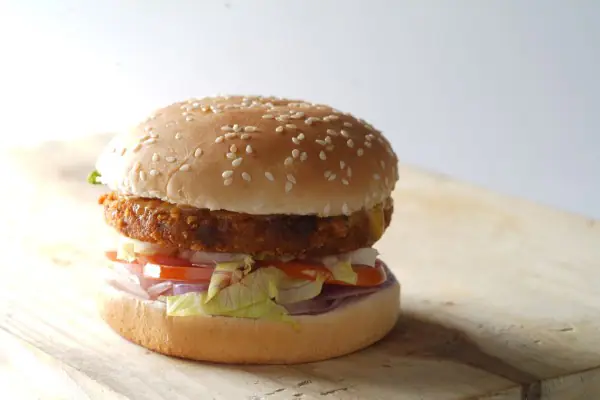 Veg Cheese Schezwan Spicy Burger