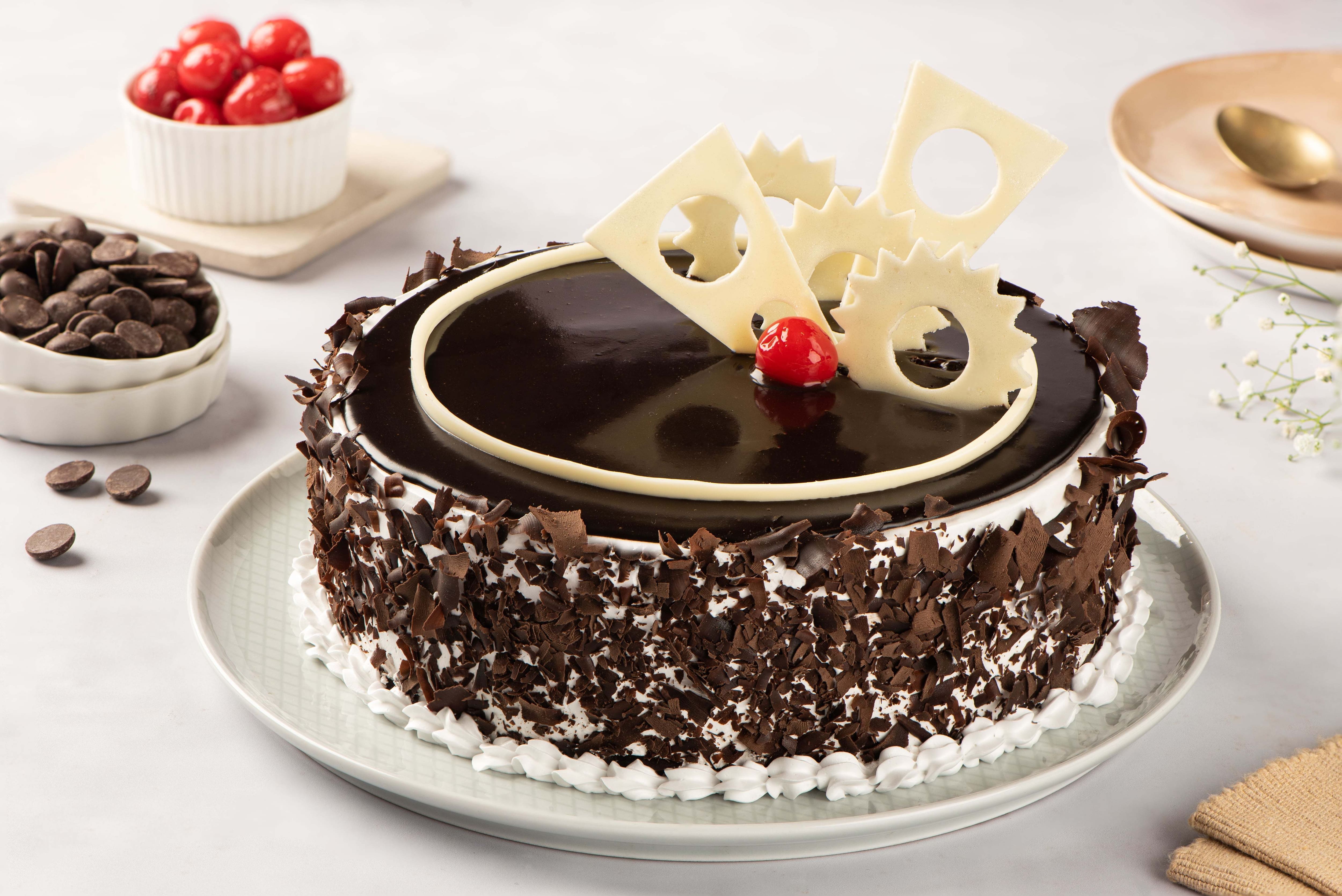 Send Mouth Watering Black Forest Cake from 3/4 Star Bakery to Kerala, India  - Page Details : keralaflowersgifts.com