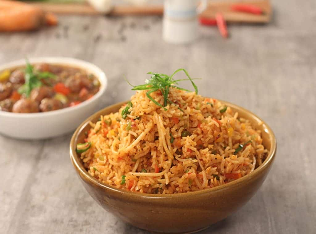 Veg Triple Schezwan Fried Rice