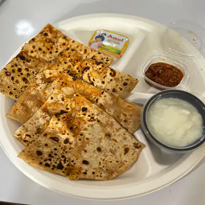 Aloo Pyaaj Paratha With Curd Butter And Pickle