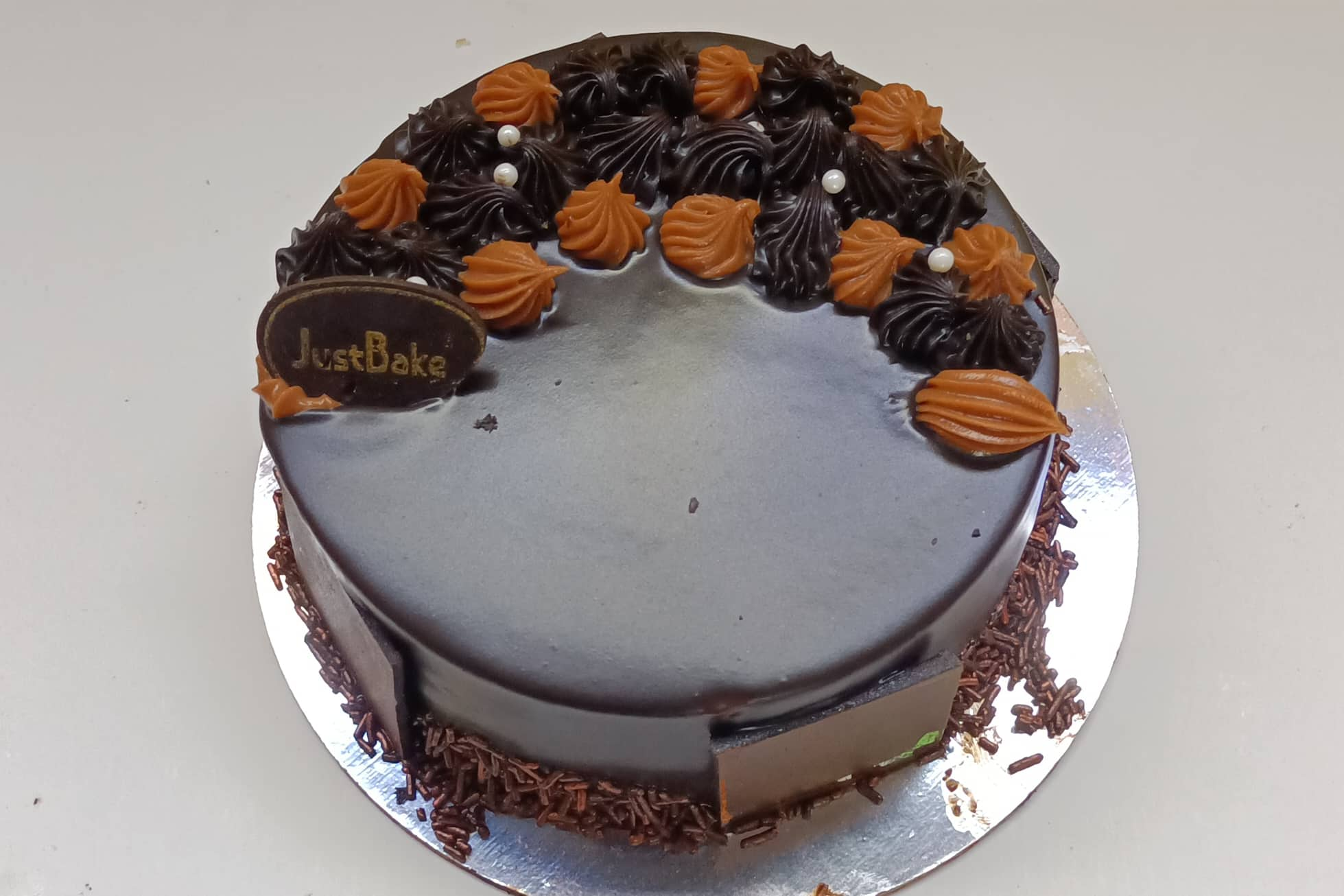 Justbakegannavaram - Belgium Truffle Cake with Real Chocolate Flavour.  Celebrate Your Special Day with Just Bake Gannavaram. Cakes for all  Occasion's: Birthday Cakes | Wedding Anniversary Cakes | Angry Bird Cakes |