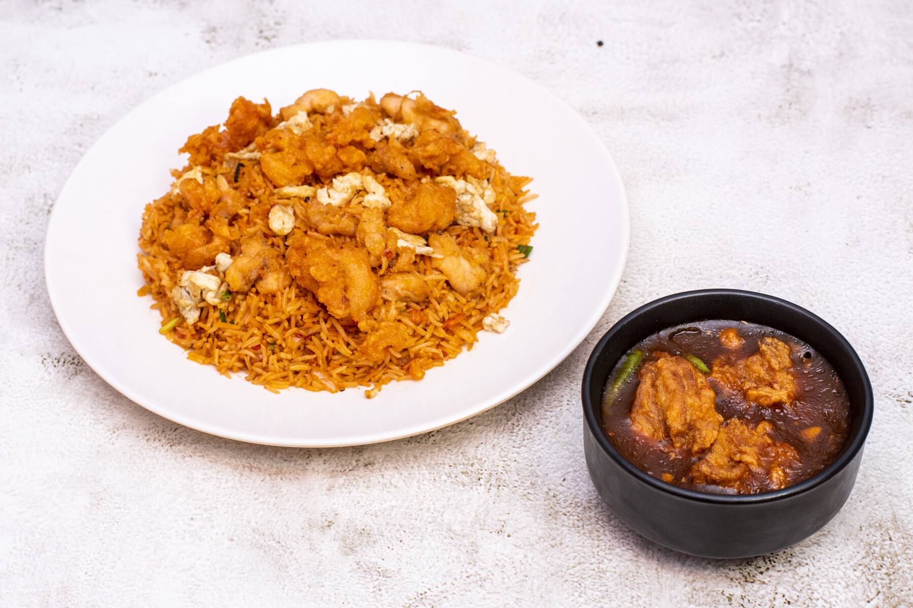 Schezwan Mixed Fried Rice With Boneless Chilli Chicken [3 Pieces]