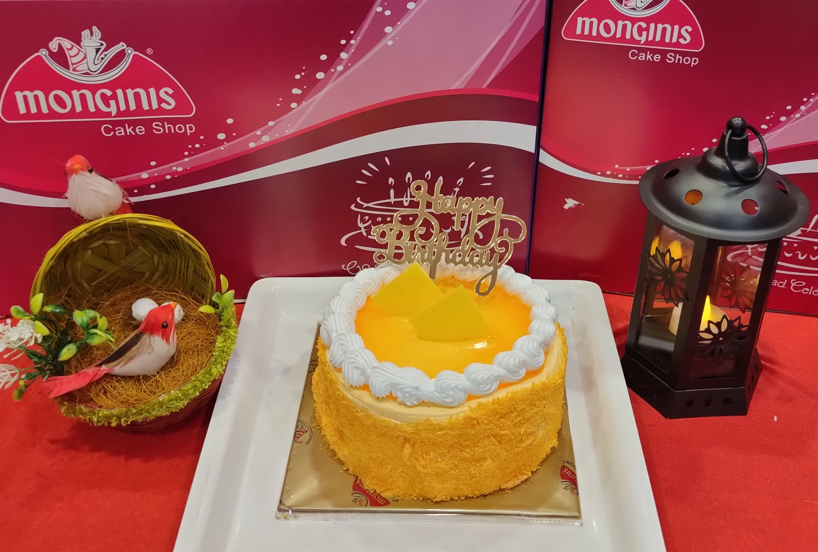 Monginis Cake Shop - Thane - This is a 3-tier Fruit Wedding cake designed  exclusively for occasions like weddings or anniversaries. It contains  flamboyant decoration of handcrafted marzipan fruits and flowers, dark
