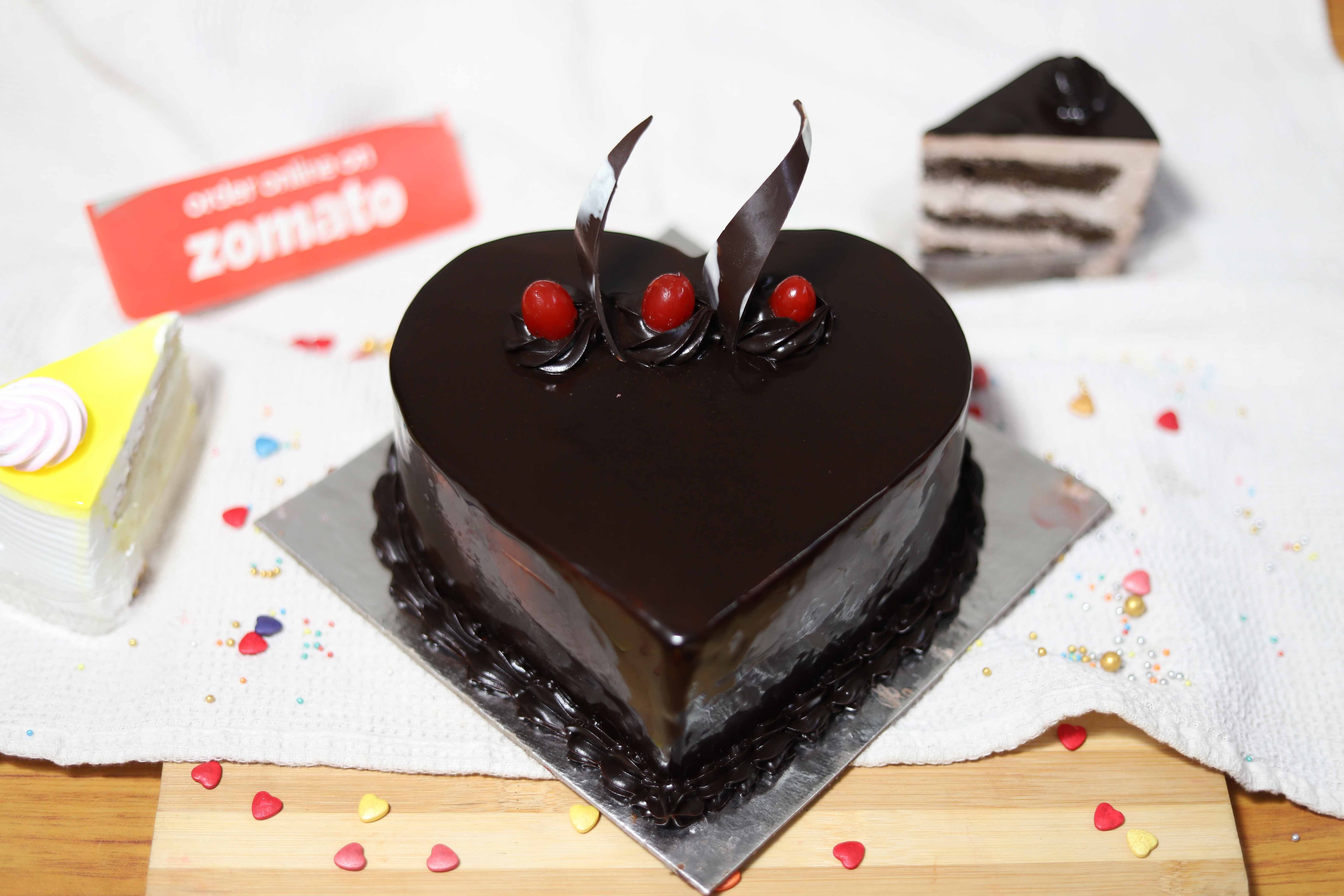 Tuxedo cake for a 50th birthday celebration 🖤💛 zomato #homebaker#sainikfarms#delicious#pretty#kidscakes#celebrationcake# birthdaycake... | Instagram