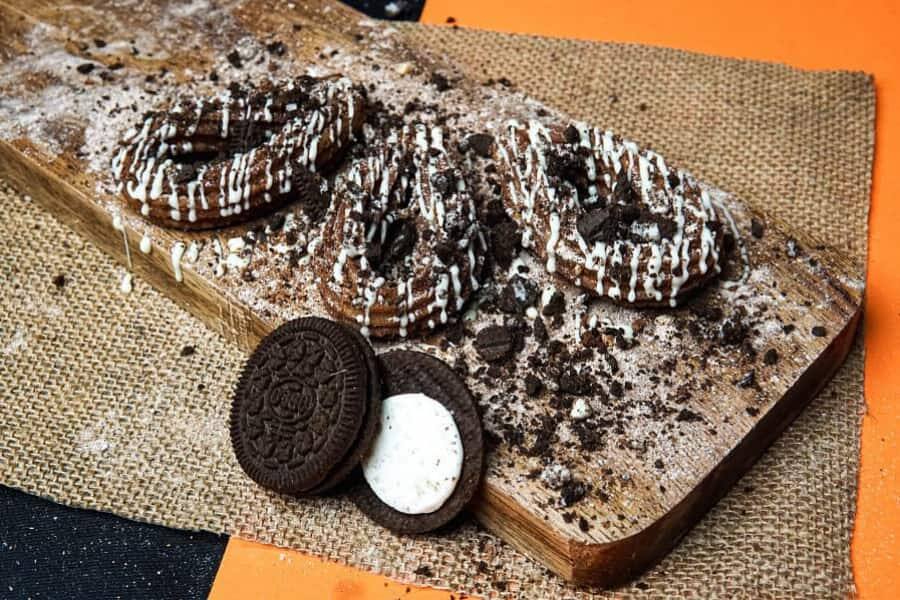 Crunchy White Oreo Glazed Churro [60% Off At Checkout ]