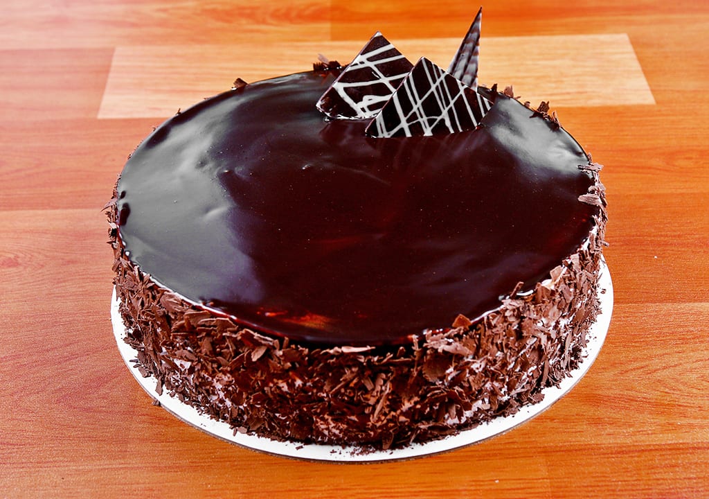 Offers & Deals on Eggless Alpine Chocolate Round Cake [Small] in Diamond  Garden, Mumbai - magicpin | January, 2024