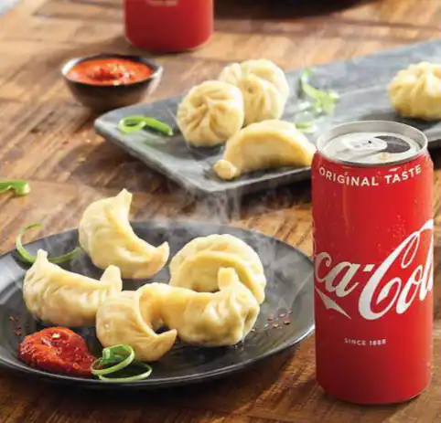 12 Veg Momo + 2 Cold Drink+(2pcsFree)