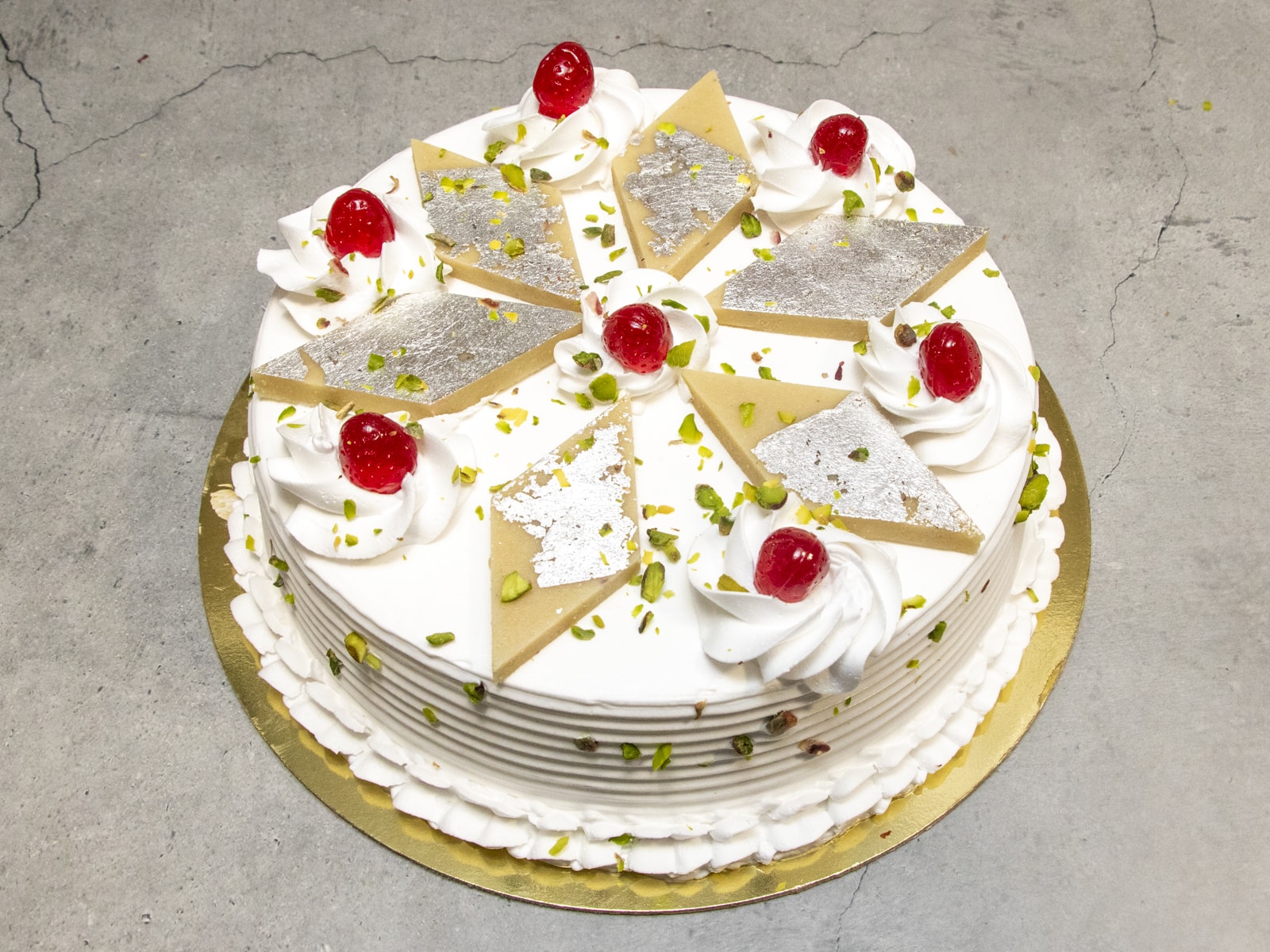 Kaju Katli shaped cake topped with... - Tricks 'n' Treats | Facebook