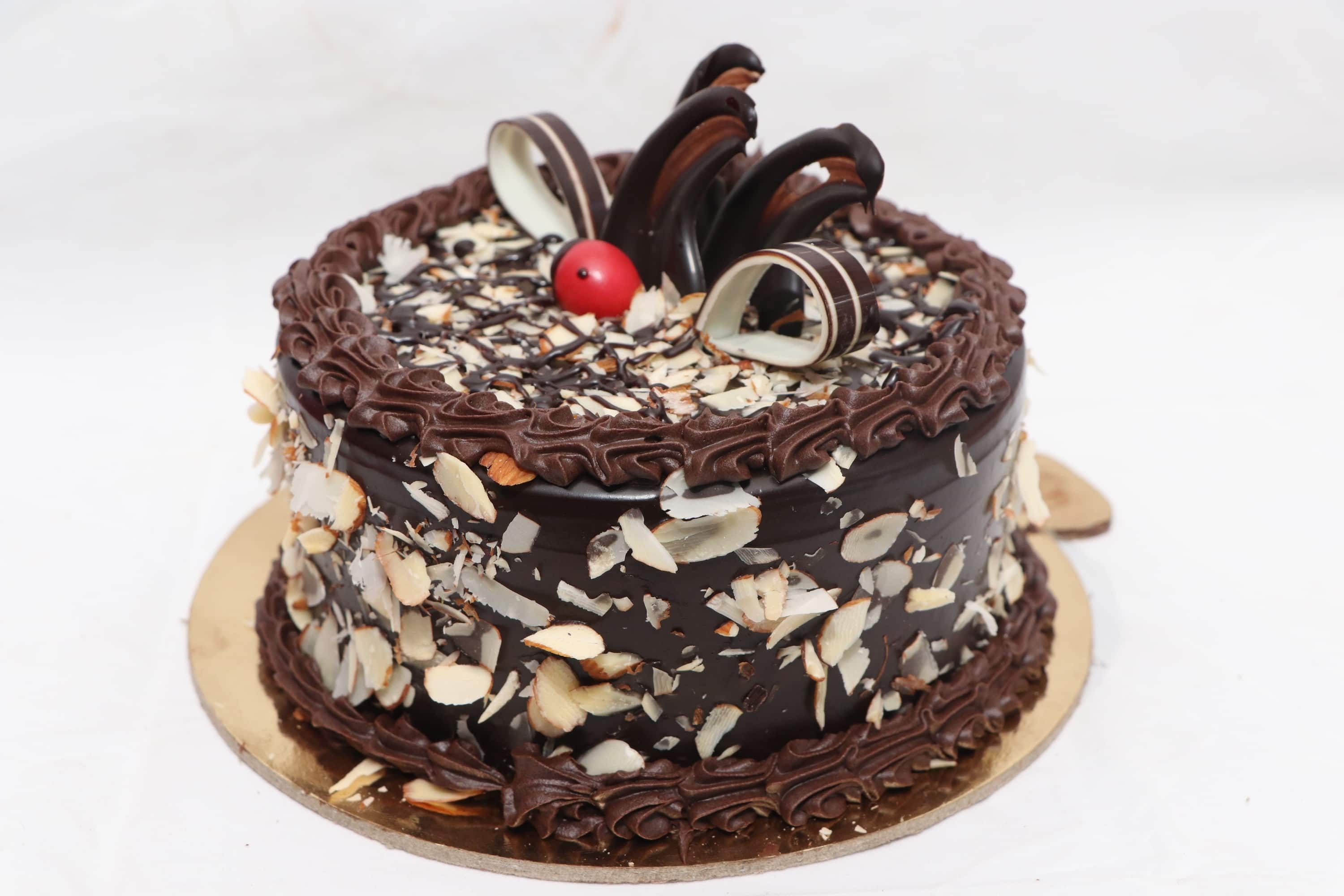 Black & Gold Ferrero Rocher Explosion Drip Cake – Zara Cakes