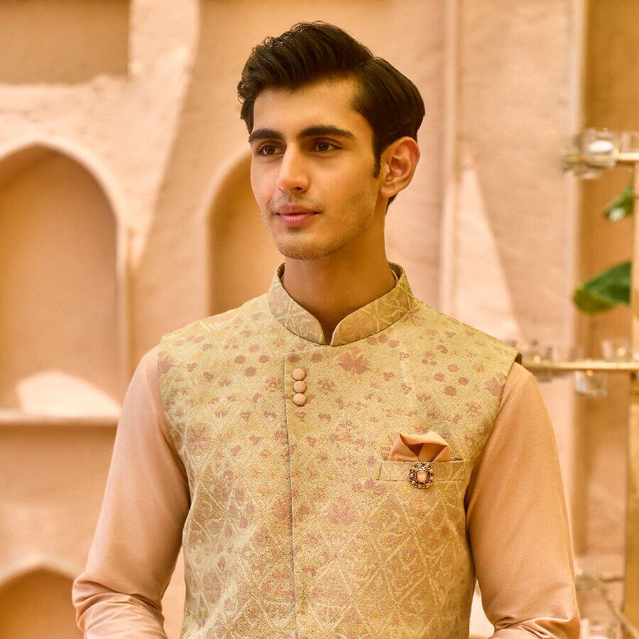 Traditional Kurta in Dusty Salmon Paired with Stylish Green Bundi
