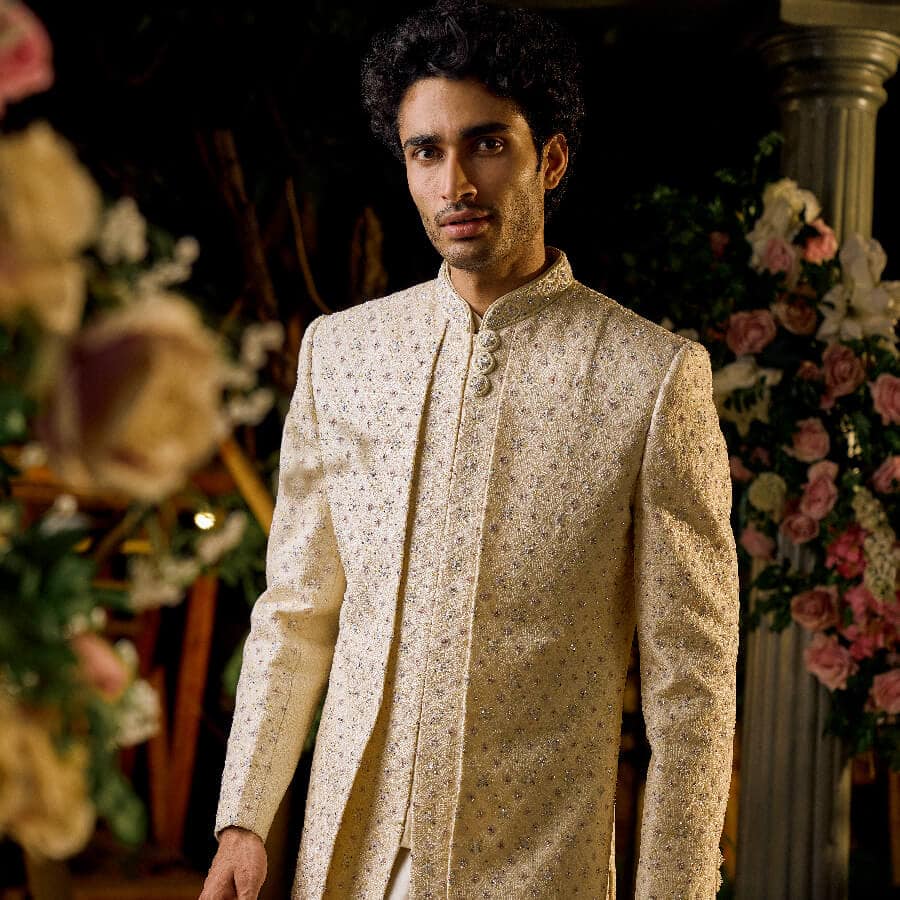 Off White Embroidered Open Jacket Paired with Kurta