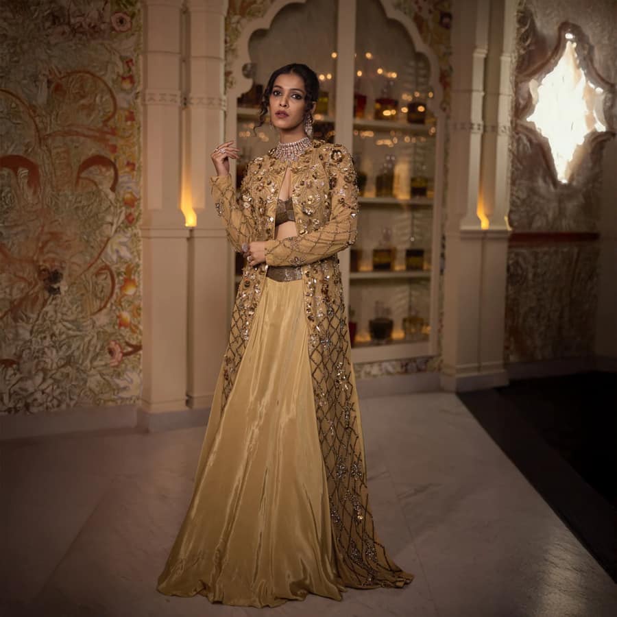 Luxe Gold Net & Crape Jacket Lehenga with Cutdana & Sequins Embroidery