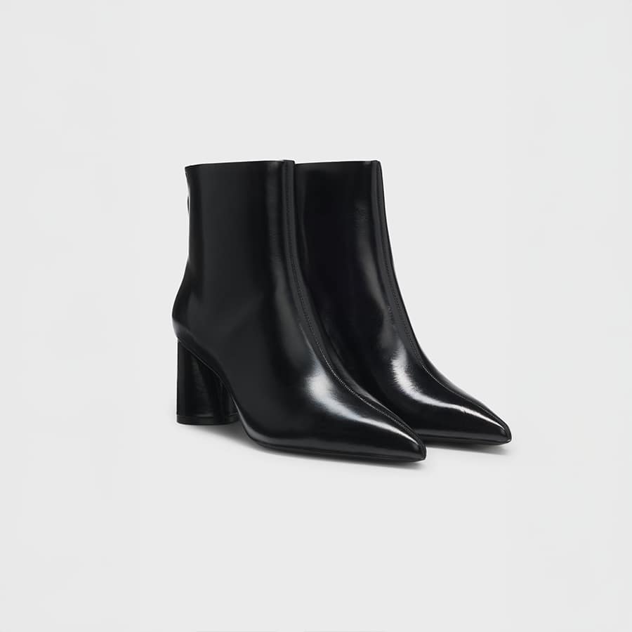 Ankle boots in leather with embossed logo
