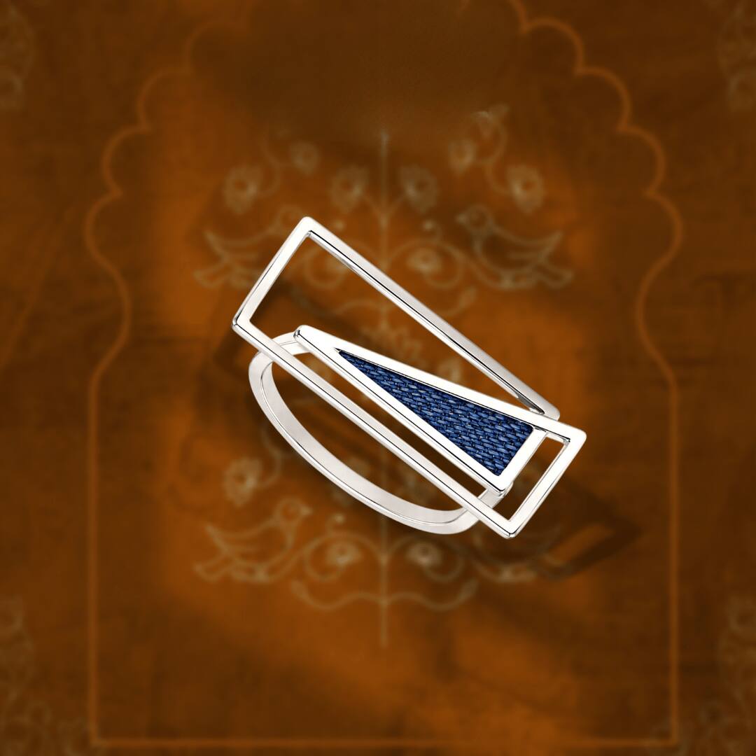 Gold ring with geometric motif and striking blue enamel finish for contemporary appeal