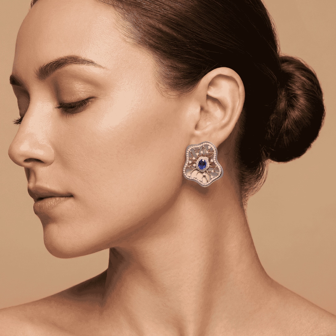 Titanium ear studs featuring abstract floral bimetal artistry with diamonds