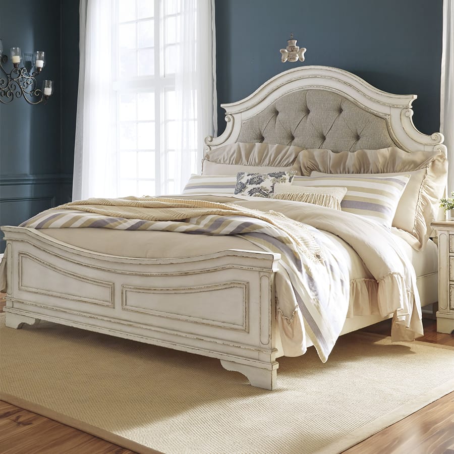 Realyn Queen Upholstered Panel Bed