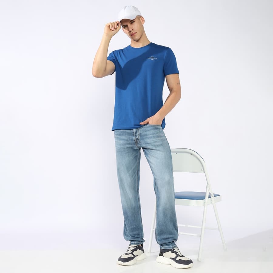 Nico Tapered Fit Mid Rise Heavy Wash Light Blue Jeans