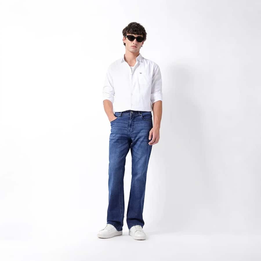 Mid Blue Mid-Rise Bootcut Jeans with Mid Fade