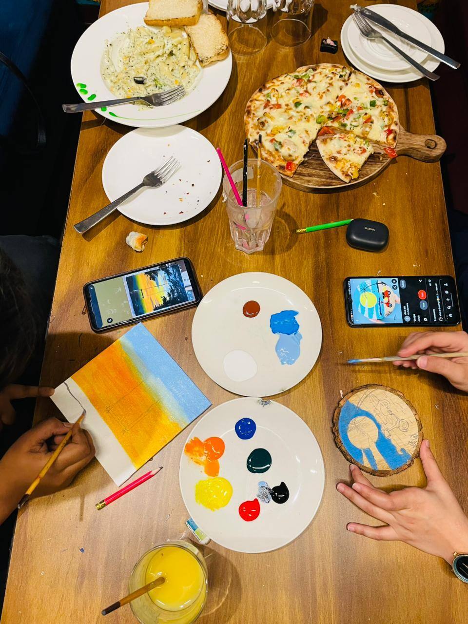 Guests enjoying a creative art activity at The Coffee Palette