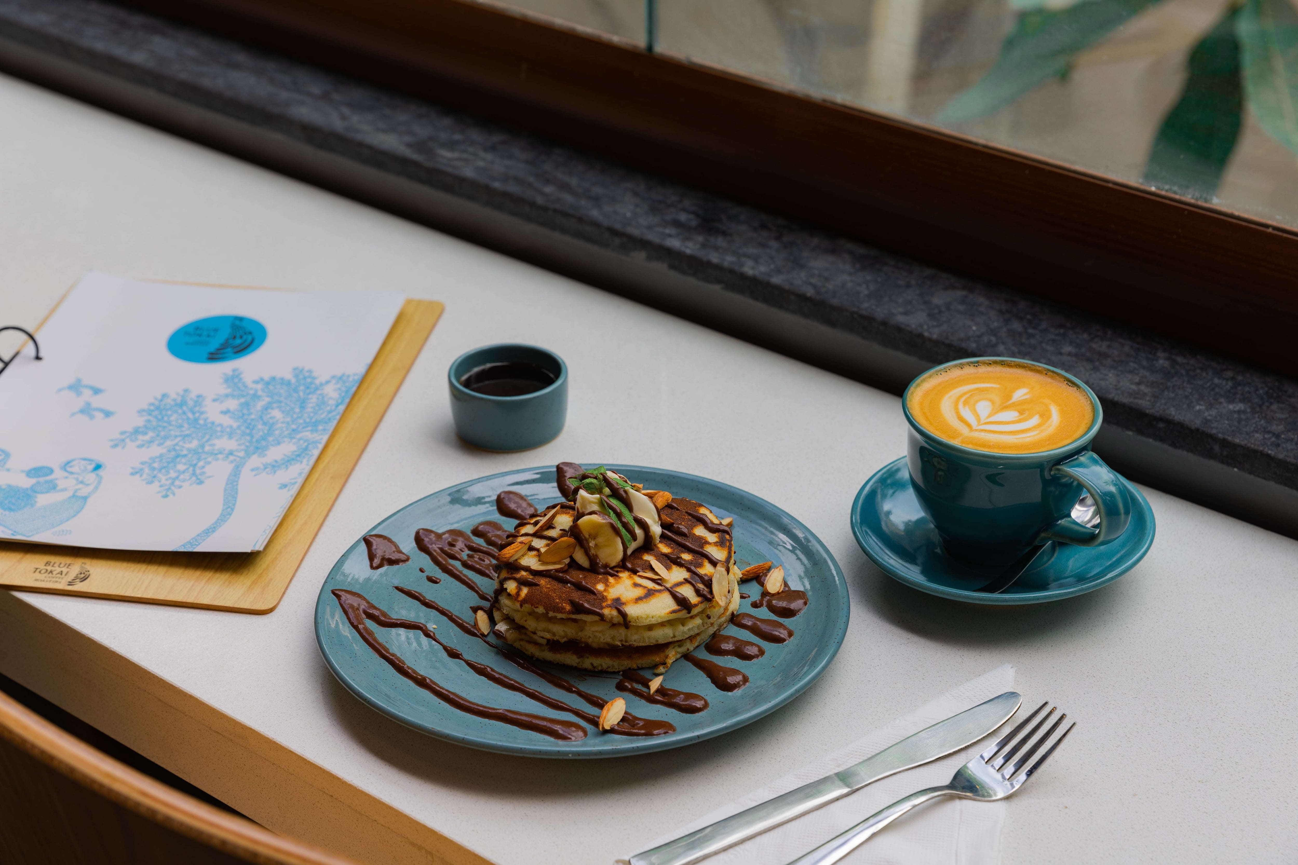 blue tokai coffee roasters omaxe world street faridabad photos