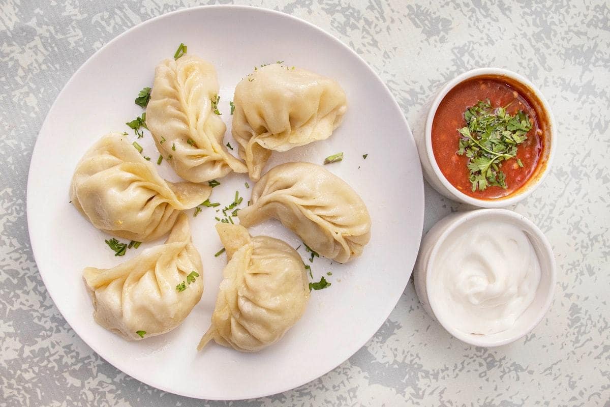 momos, momo restaurants, steamed momos, fried momos, chicken momos, veg momos - Momos Delight - img1