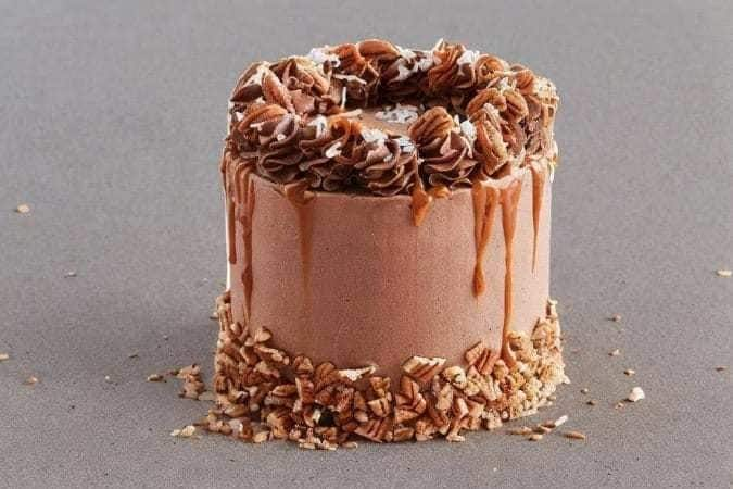 Birthday cake for adults is a coffee cheesecake with salted walnut praline