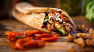 Juicy chicken shawarma, a mouthwatering Middle Eastern delight. Generative  AI. 27299663 Stock Photo at Vecteezy