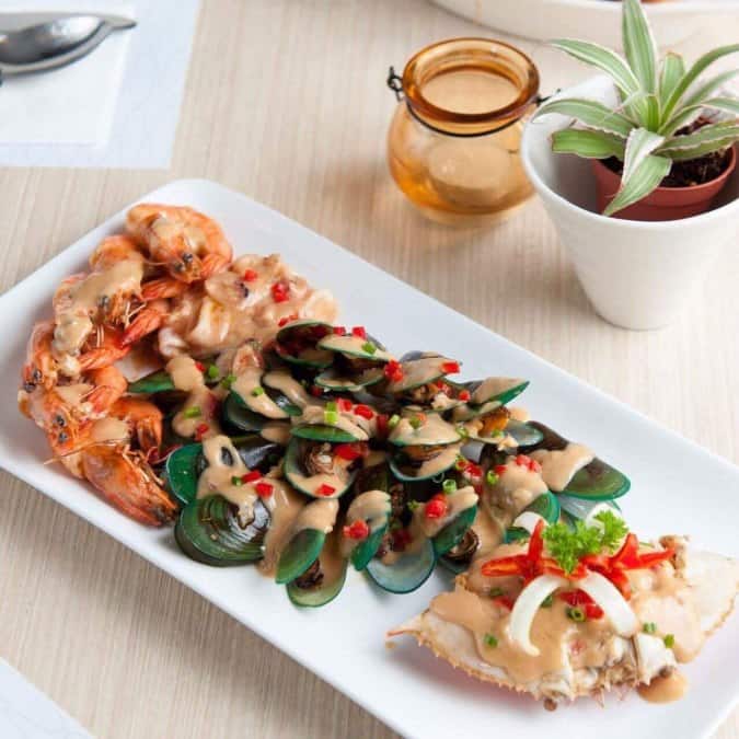 Book table at Limbaga 77 Cafe Restaurant, Tomas Morato, Quezon City