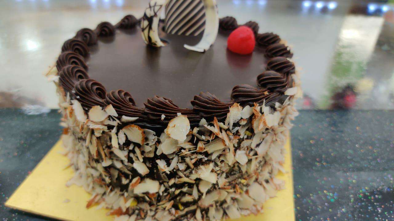 Seven Sins Chocolate Cake - Sprinkle Bakes | Amazing chocolate cake recipe,  Cake recipes, Chocolate cake recipe